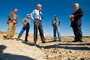 U.S. Senator Jeff Bingaman speaks with local officials at a site near Ya-Ta-Hey Monday morning. The site will be a pumping station for the Navajo-Gallup Water Supply Project, of which Bingaman was instrumental in making happen. © 2011 Gallup Independent / Brian Leddy